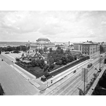 A vintage, black and white photograph of Columbia University with the Hudson River in the background