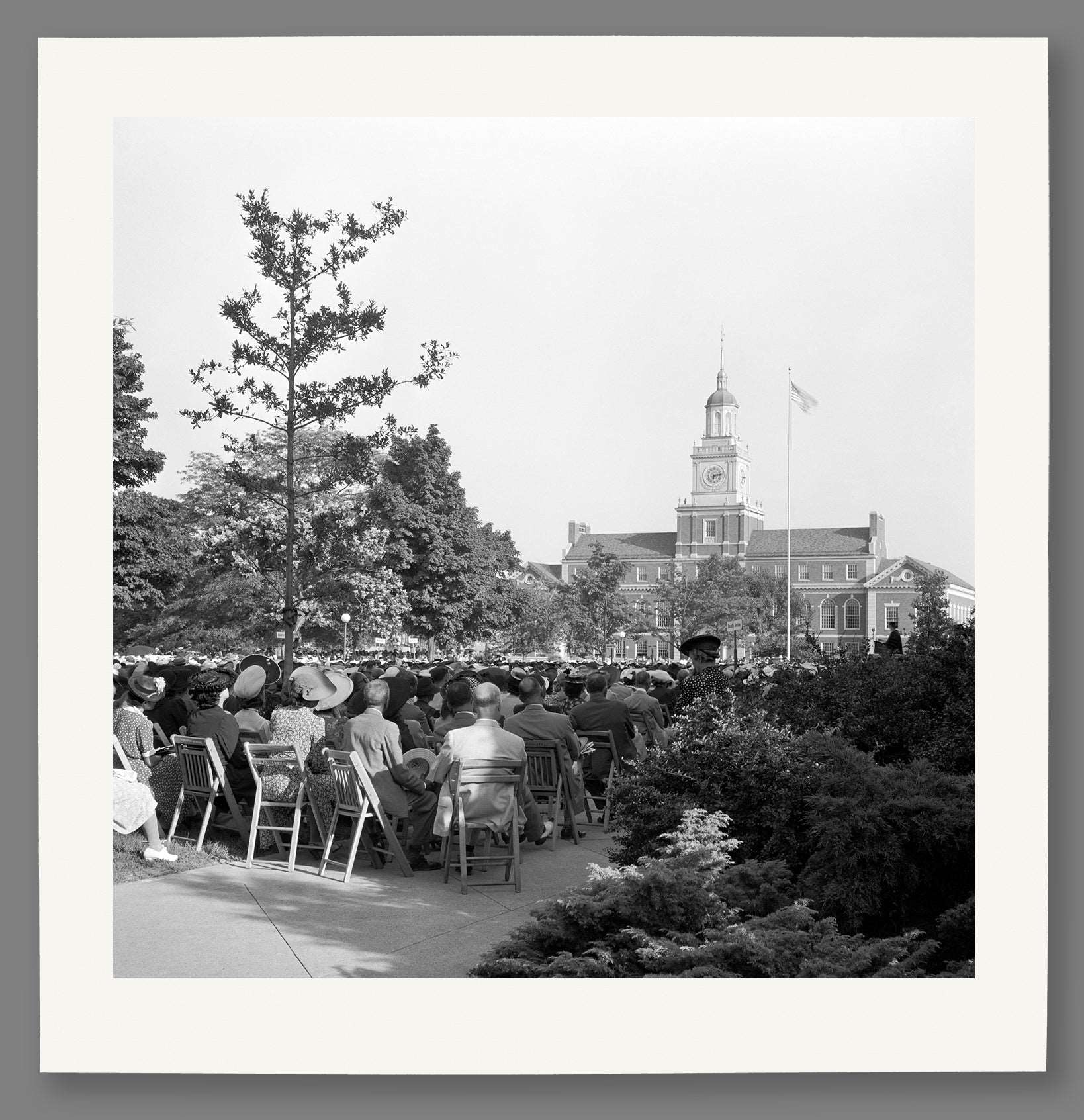 A paper reproduction print of a vintage image of Howard University's commencement