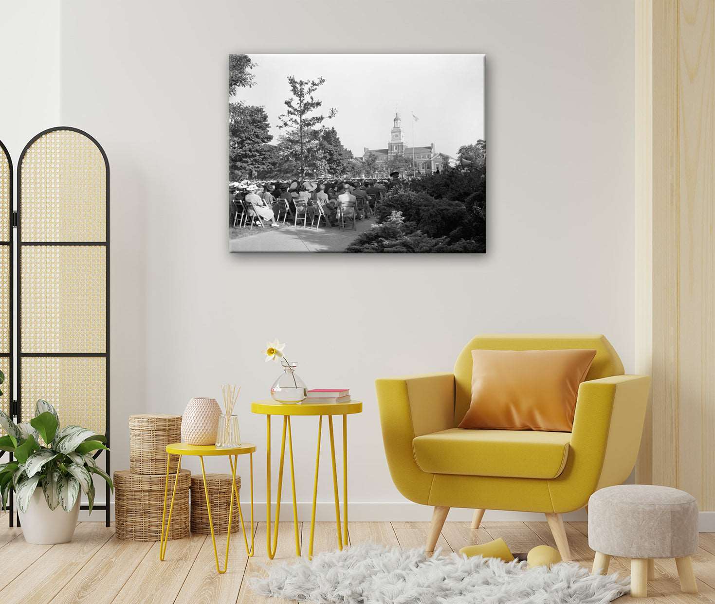 A brightly colored living room with a canvas print of a vintage photograph of Howard University on the wall