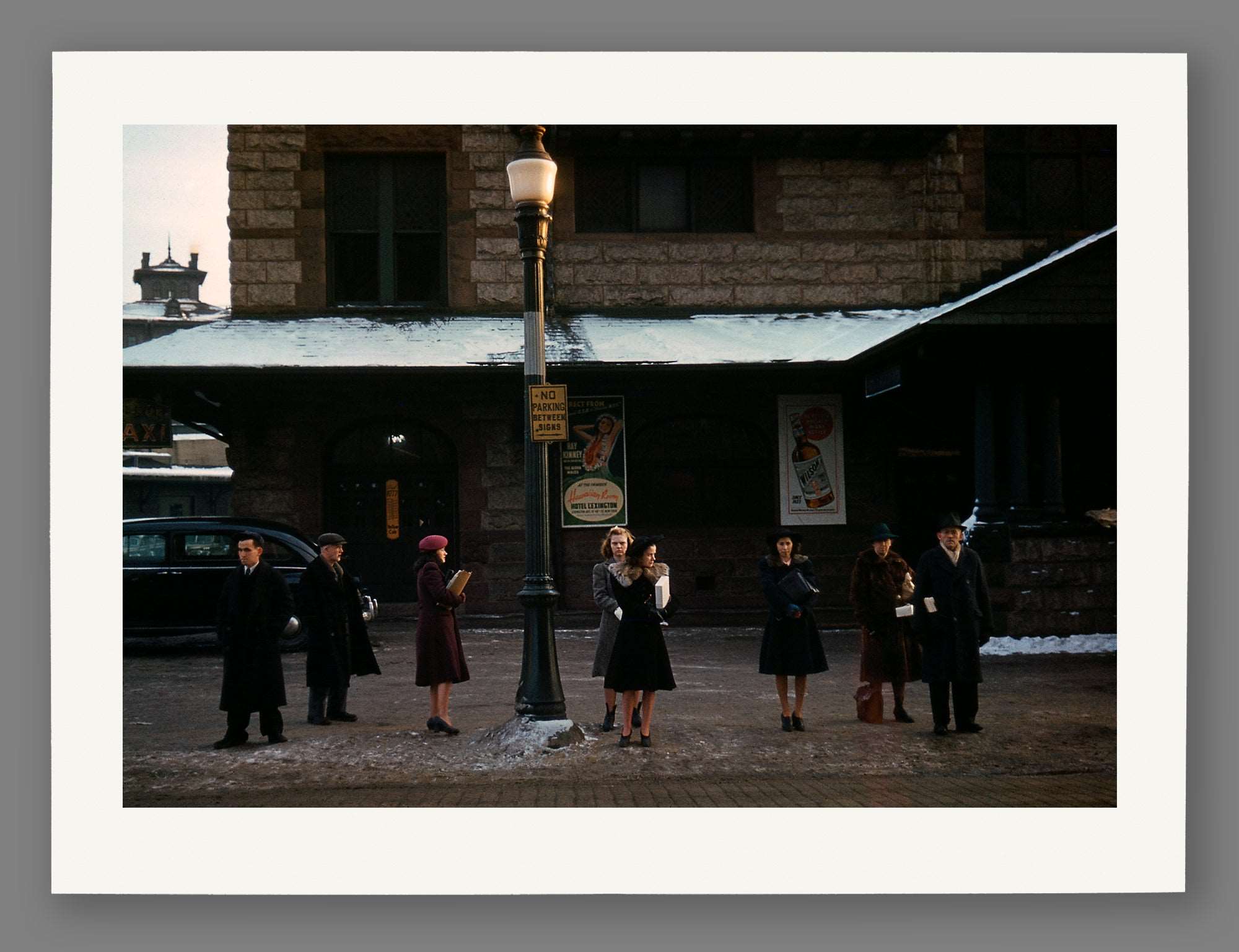 A paper reproduction print of color vintage photograph of commuters in Lowell, Massachusetts