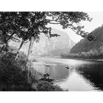 A vintage photograph of two small canoes on the Delaware Water Gap