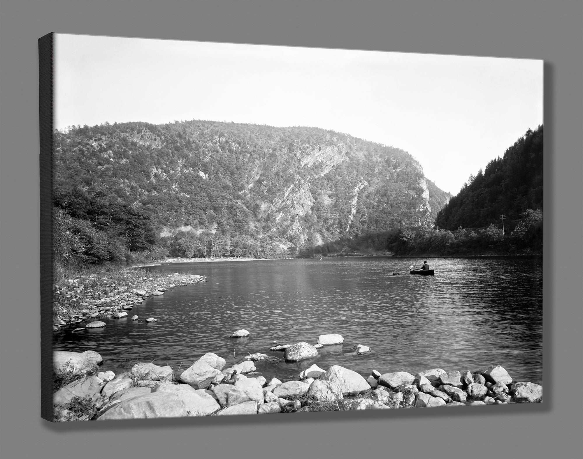 A canvas print reproduction of vintage photography of a canoer on the Delaware Water Gap