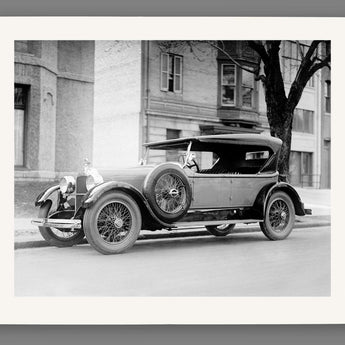 A fine art paper print of vintage photography featuring a Dusenberg Car