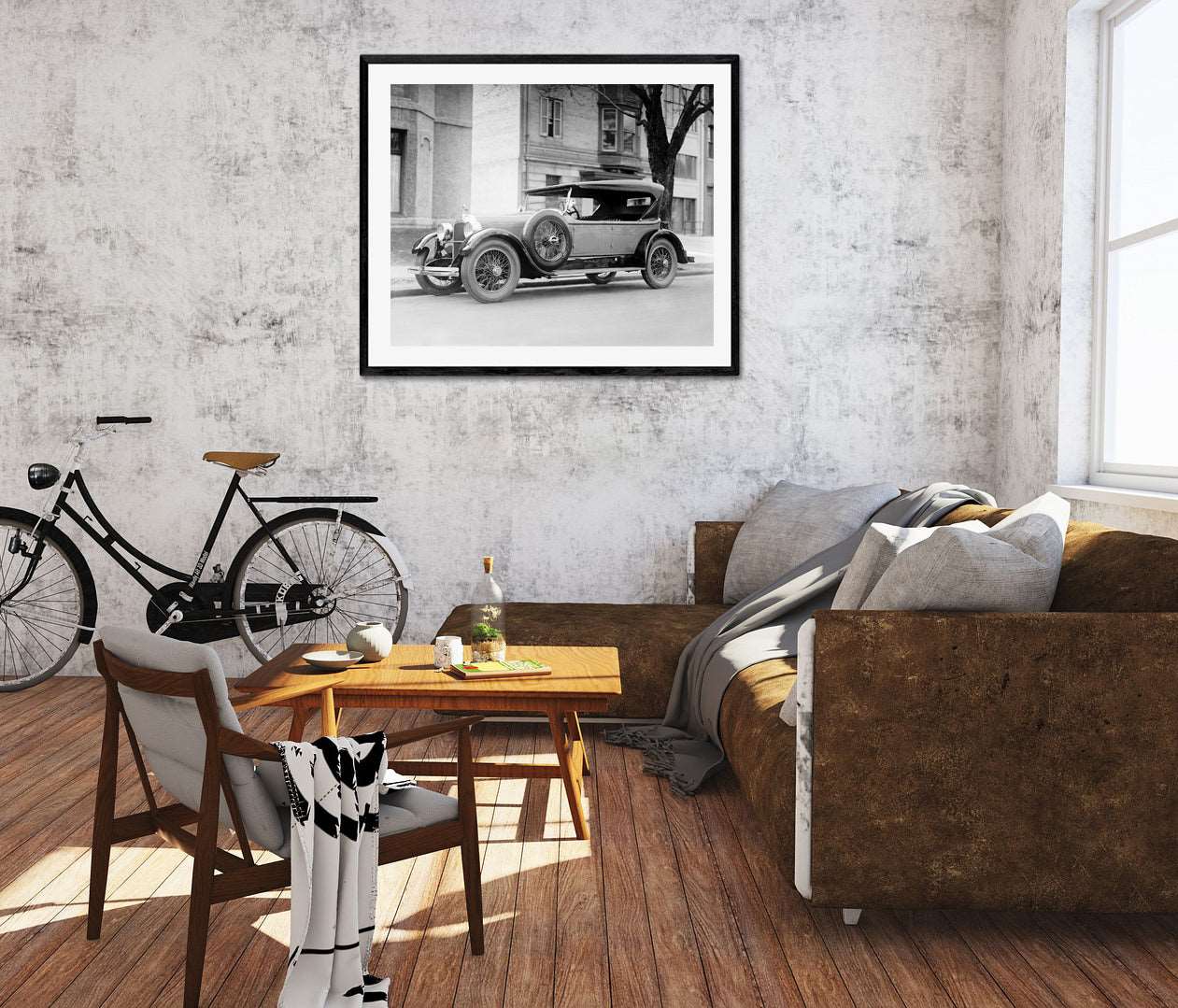 A rendering of a living room with a framed paper print on the wall, featuring vintage photography