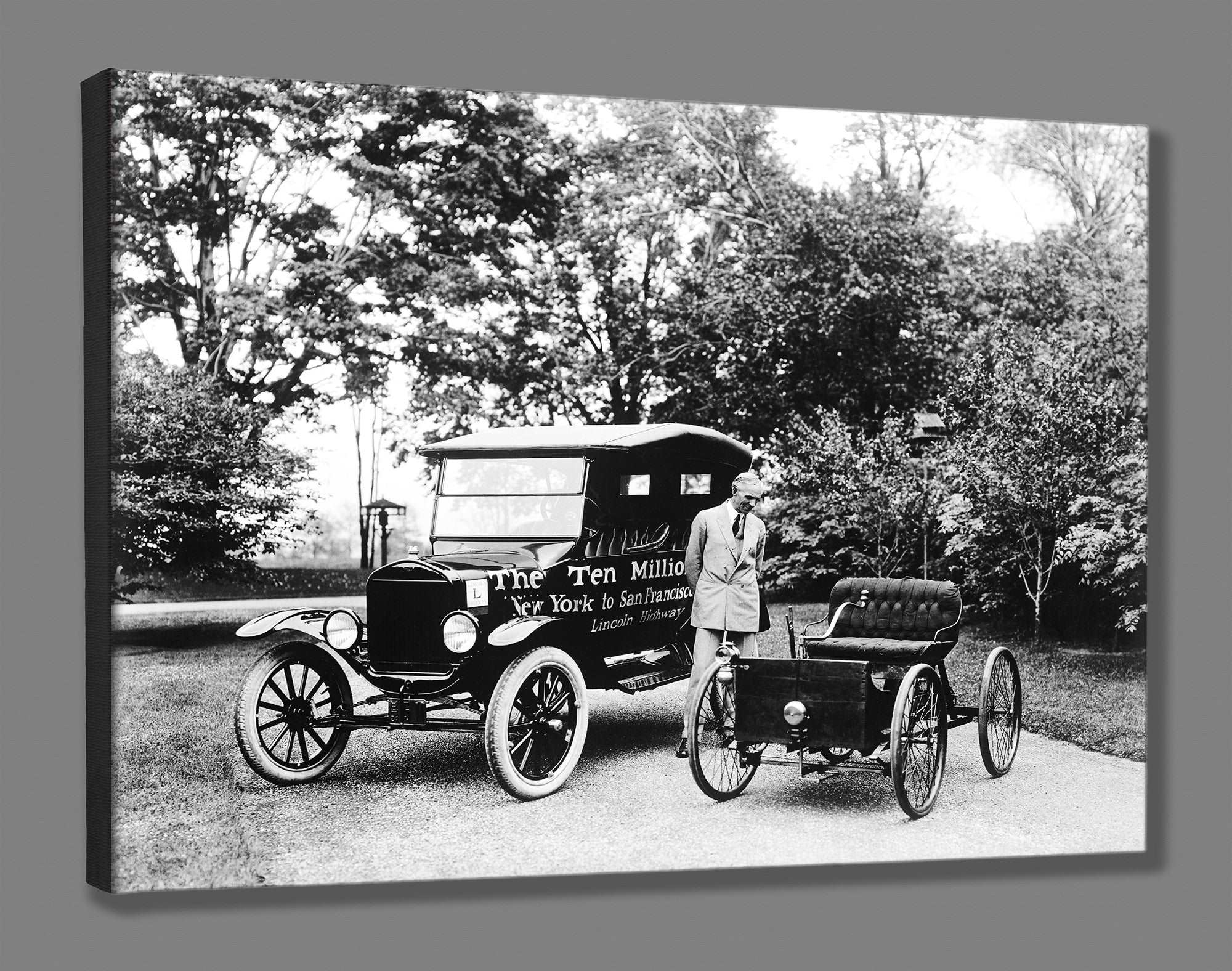 A canvas print of a vintage photo of Henry Ford with two different Ford models
