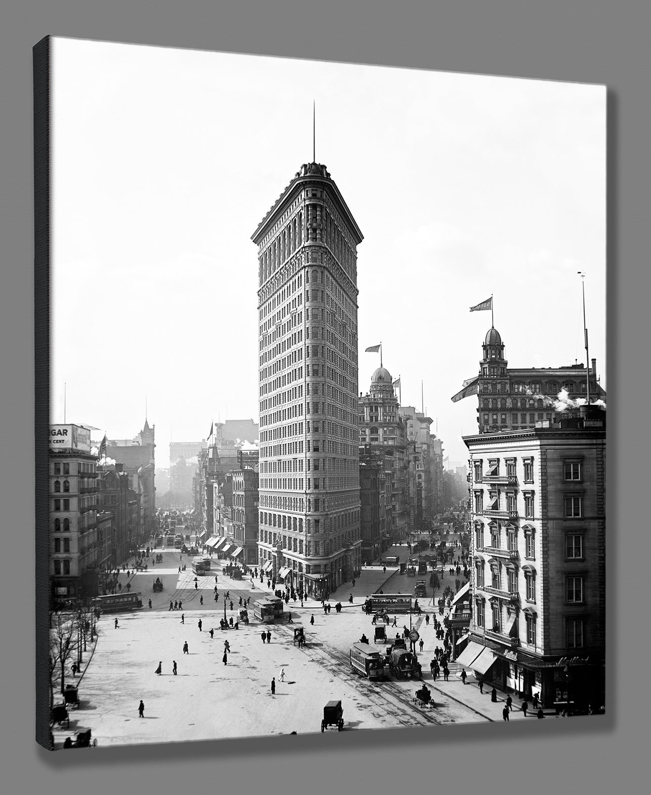 A digital mockup of a canvas print of a photograph of New York City, featuring the Flatiron Building