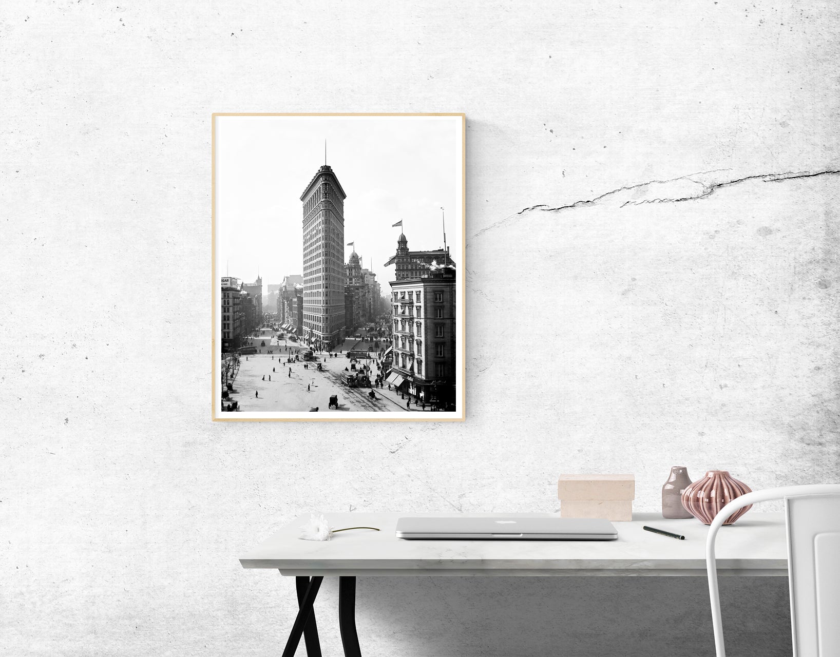 A framed paper print mockup of a photograph of the Flatiron Building in New York City