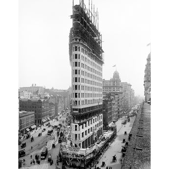 Black and white vintage photograph of the Flatiron Building under construction in New York City