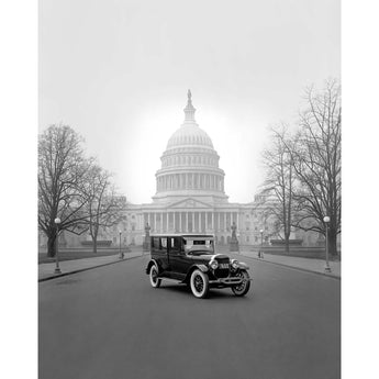 A vintage photograph of a Ford Lincoln Model Car in front of the Capitol Building in Washington DC