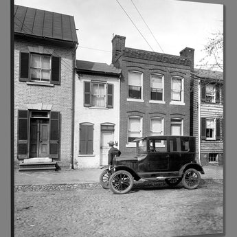 A mockup canvas print of a vintage image of a Ford vehicle at the Spite House in Alexandria