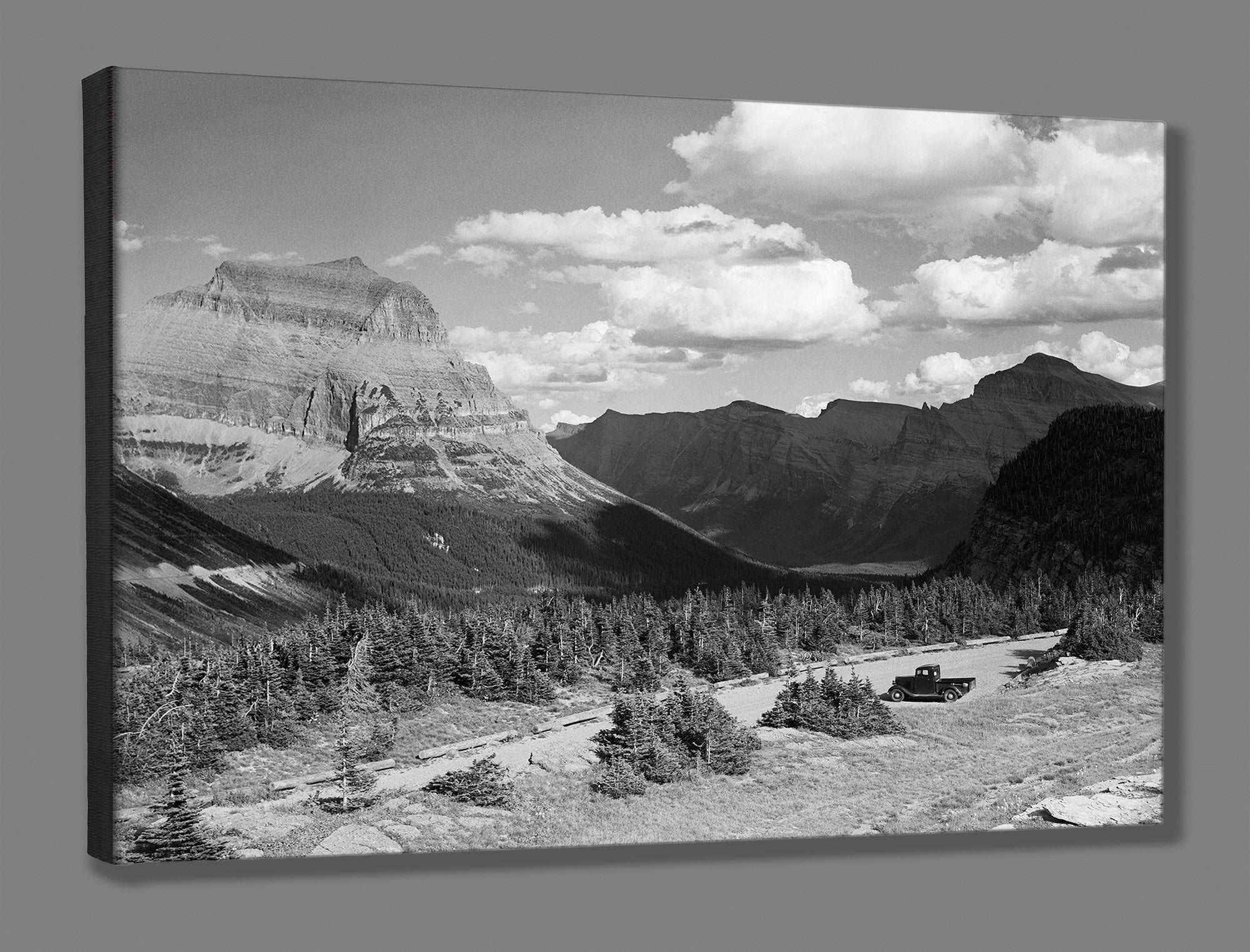 A canvas reproduction print of a vintage landscape photograph of Glacier National Park