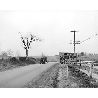 A vintage image of a car driving down US 50 in Frederick County, Virginia