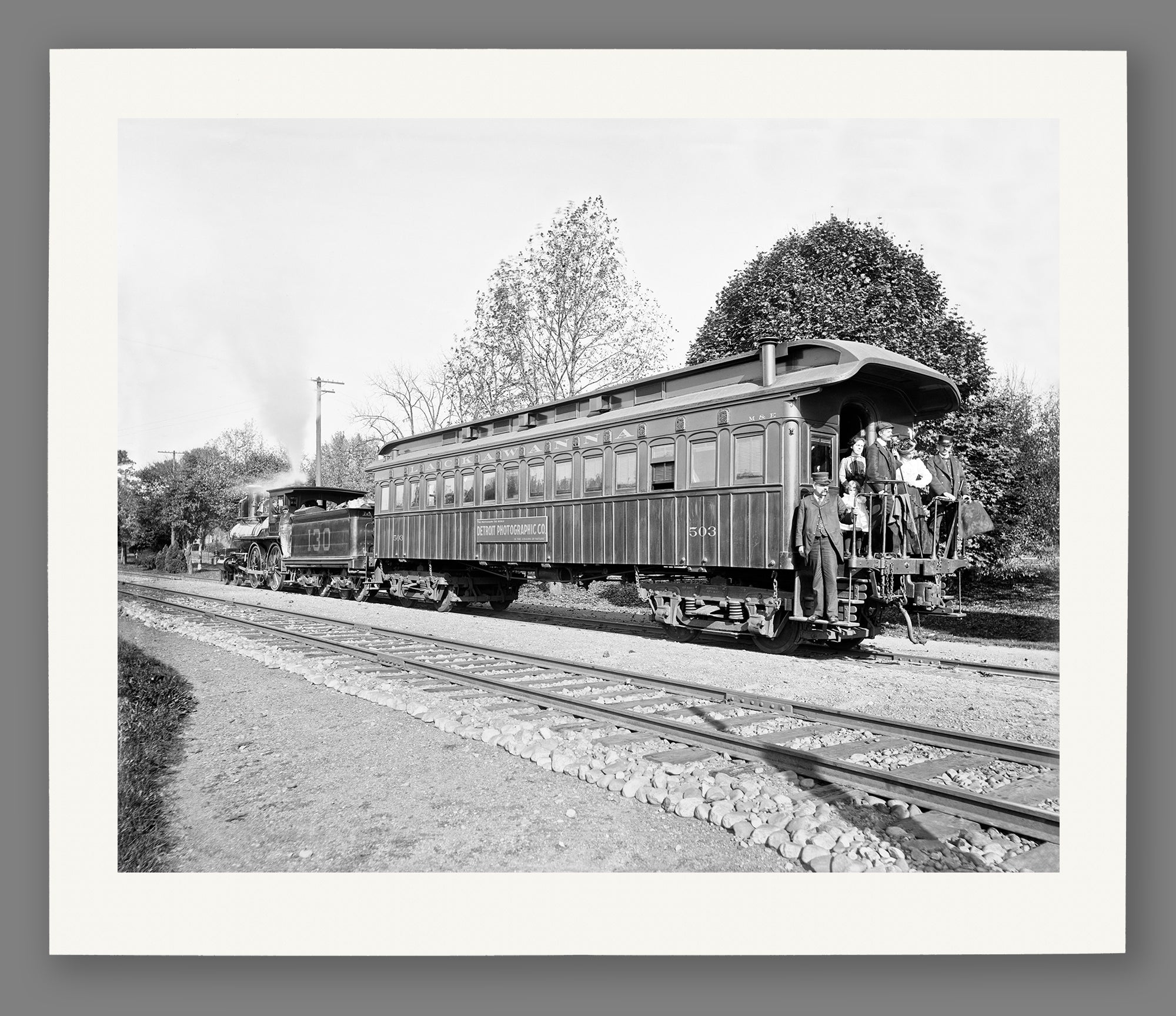 A fine art paper print reproduction of a black and white photograph of a Lackawanna Photo Car