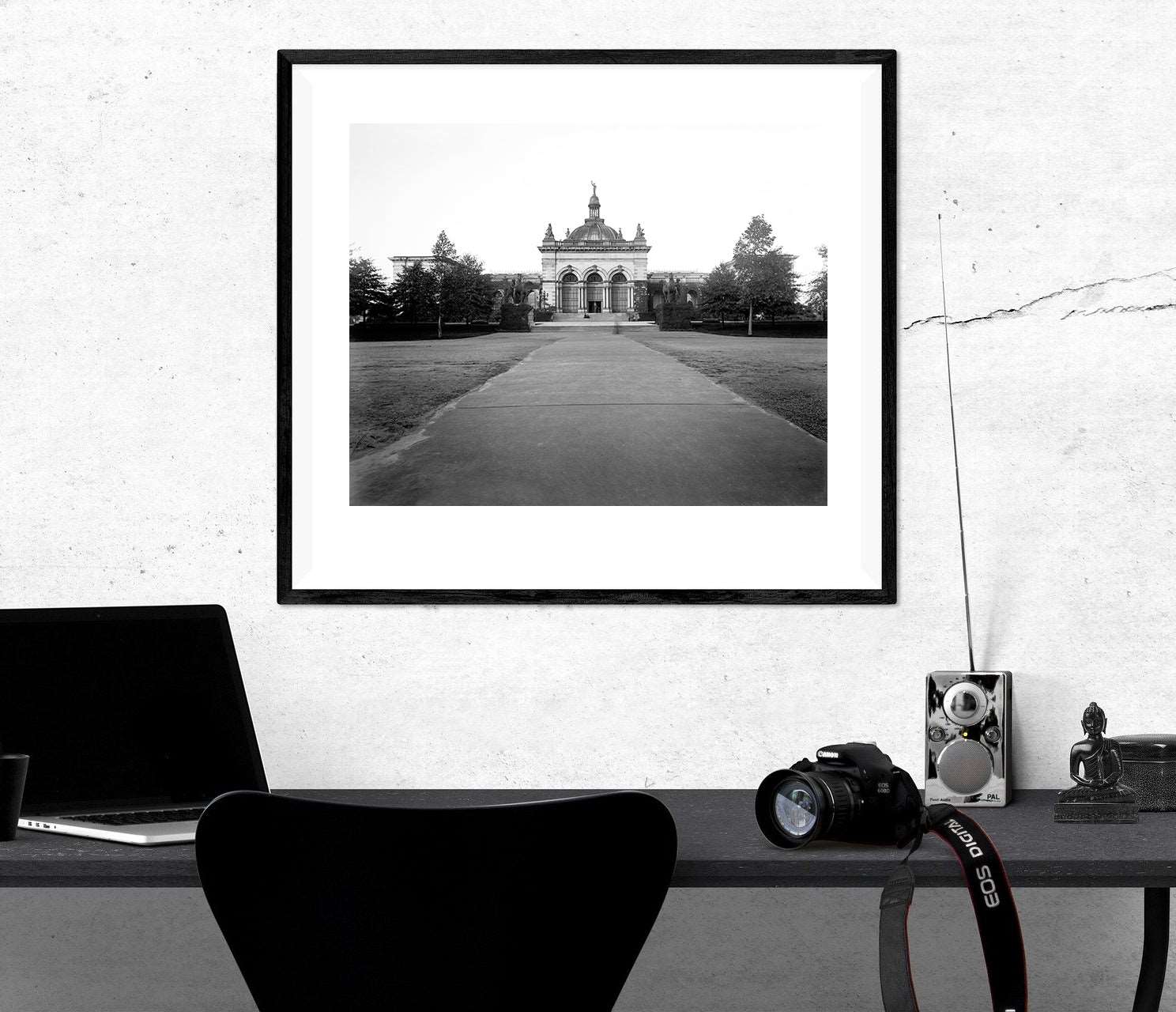 A framed paper print featuring a photograph of Fairmount Park in Philadelphia, hanging in an office
