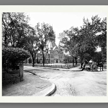 A paper reproduction print of a vintage photo of Harvard University