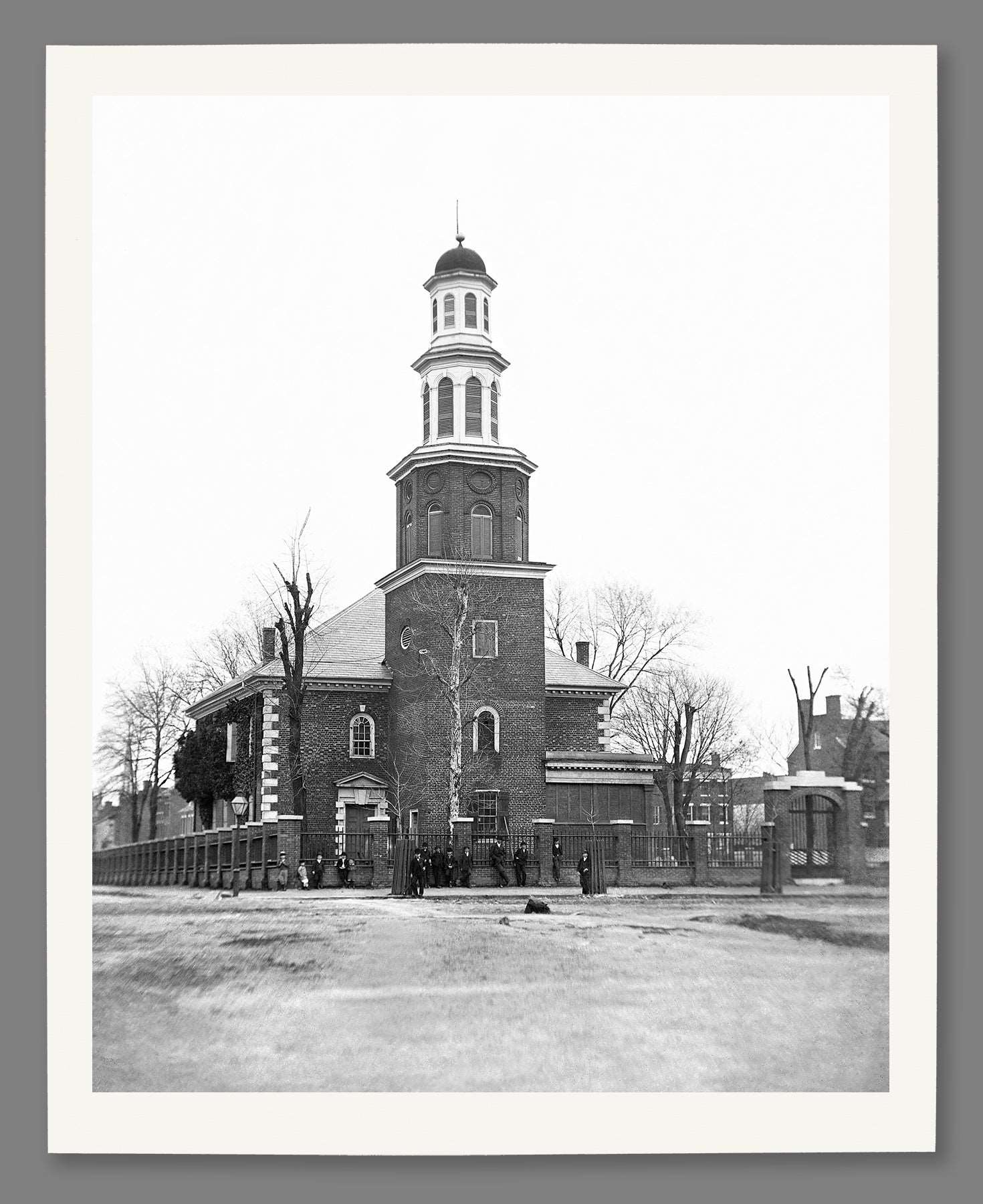 A paper print of a vintage photo of a church in Alexandria