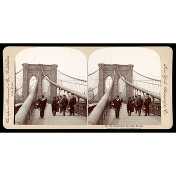 A vintage stereograph image of people walking on the Promenade of the Brooklyn Bridge