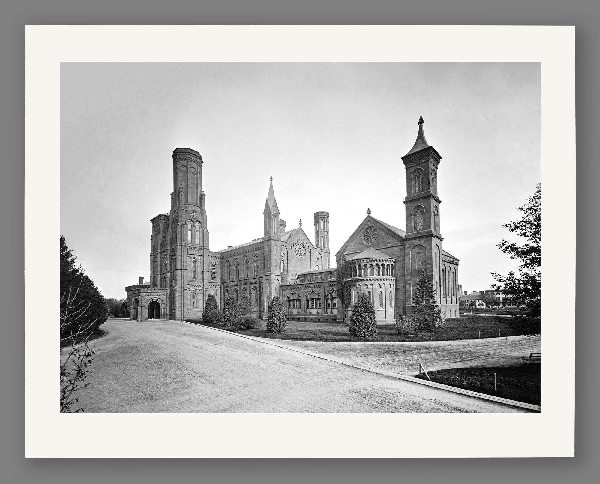 A paper print mockup featuring a vintage image of the Smithsonian Castle