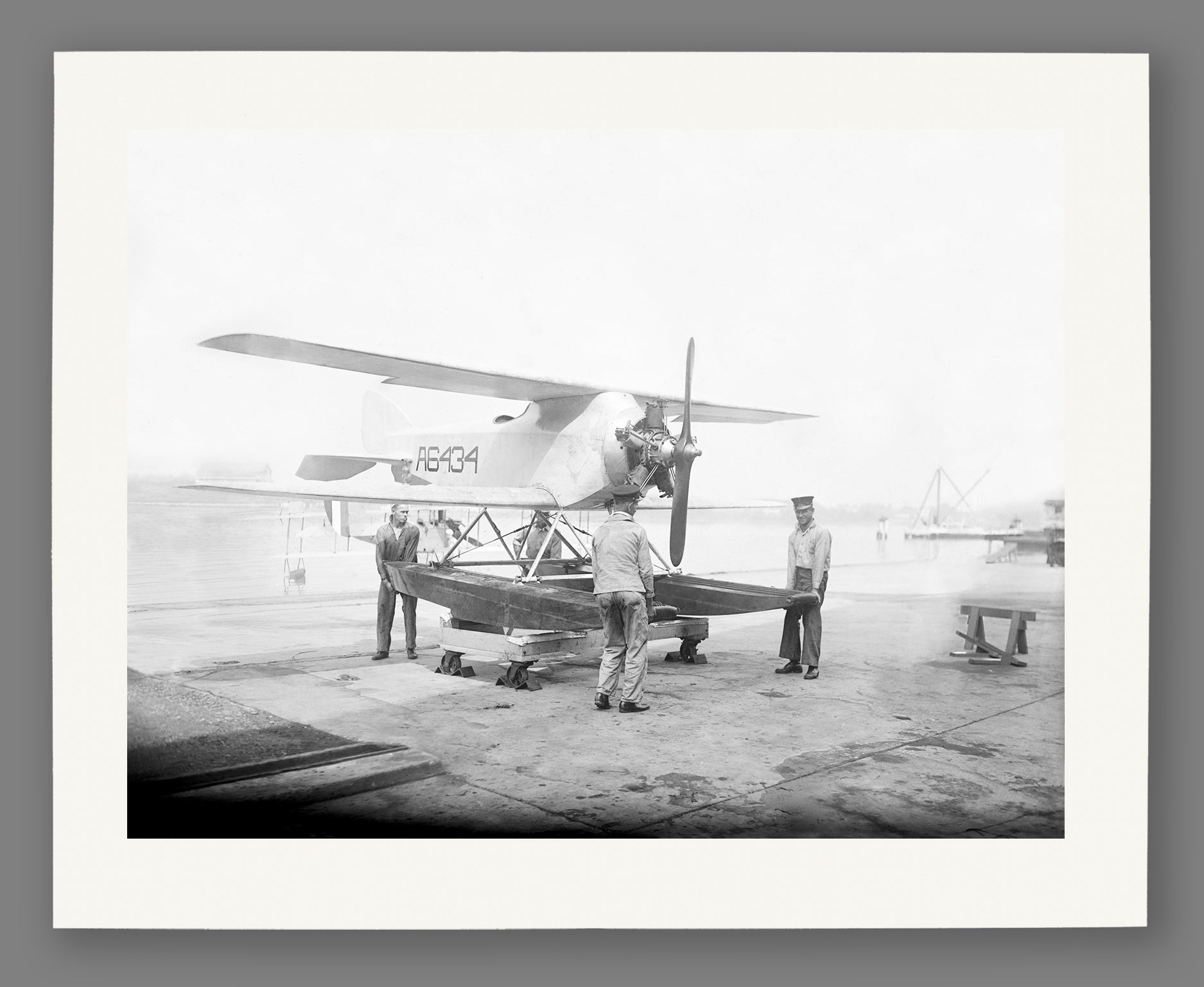 An archival paper print of a vintage photograph of a submarine plane