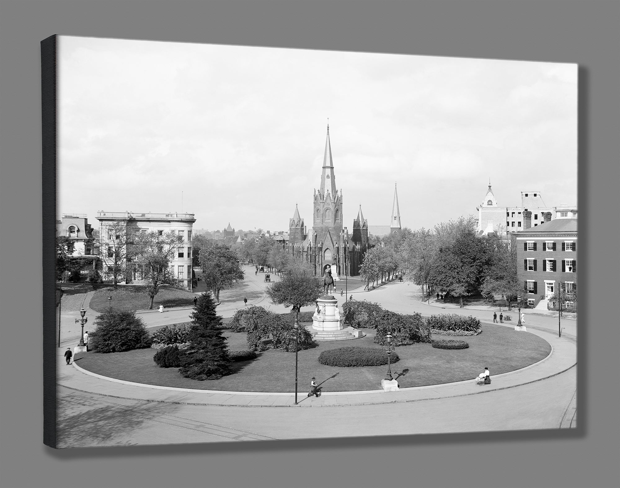 A stretched canvas print of a black and white photo of Washington DC's Thomas Circle