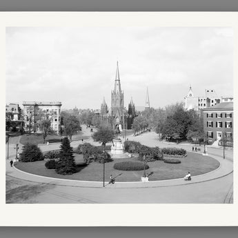 A paper print reproduction of a vintage photograph of Thomas Circle in DC