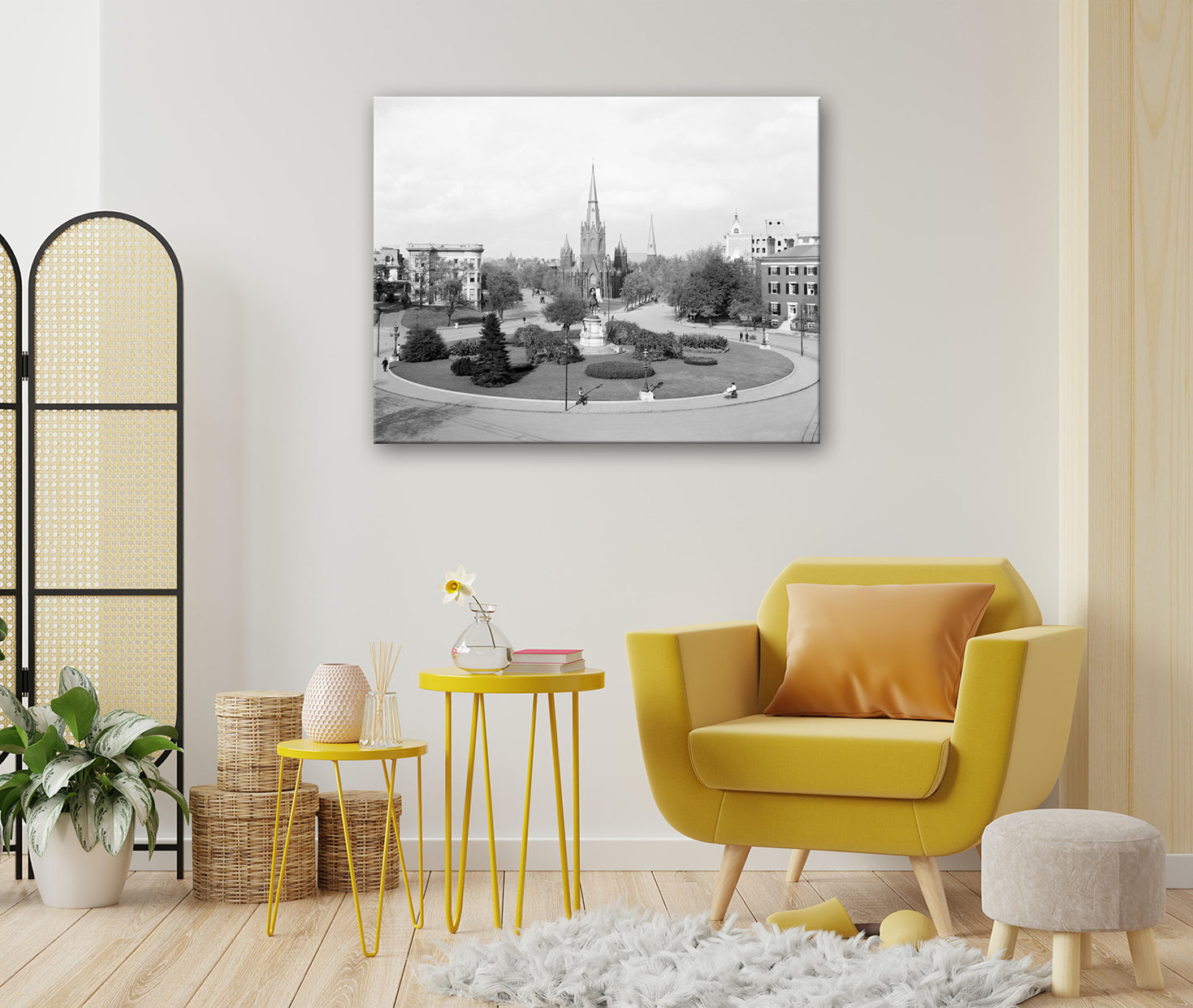 A brightly decorated living room with a canvas print on the wall