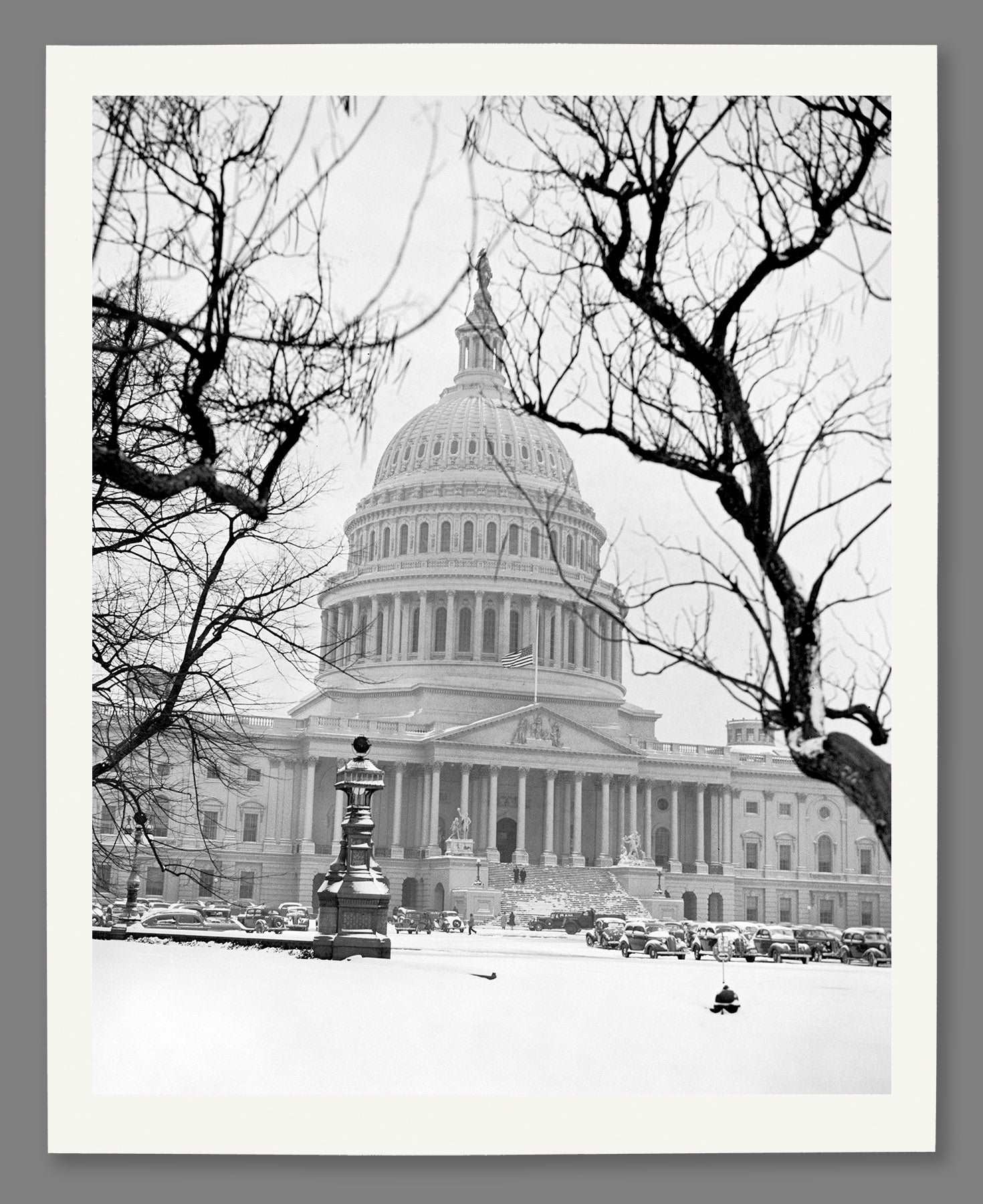 A fine art paper reproduction print of a vintage photo of the US Capitol in winter