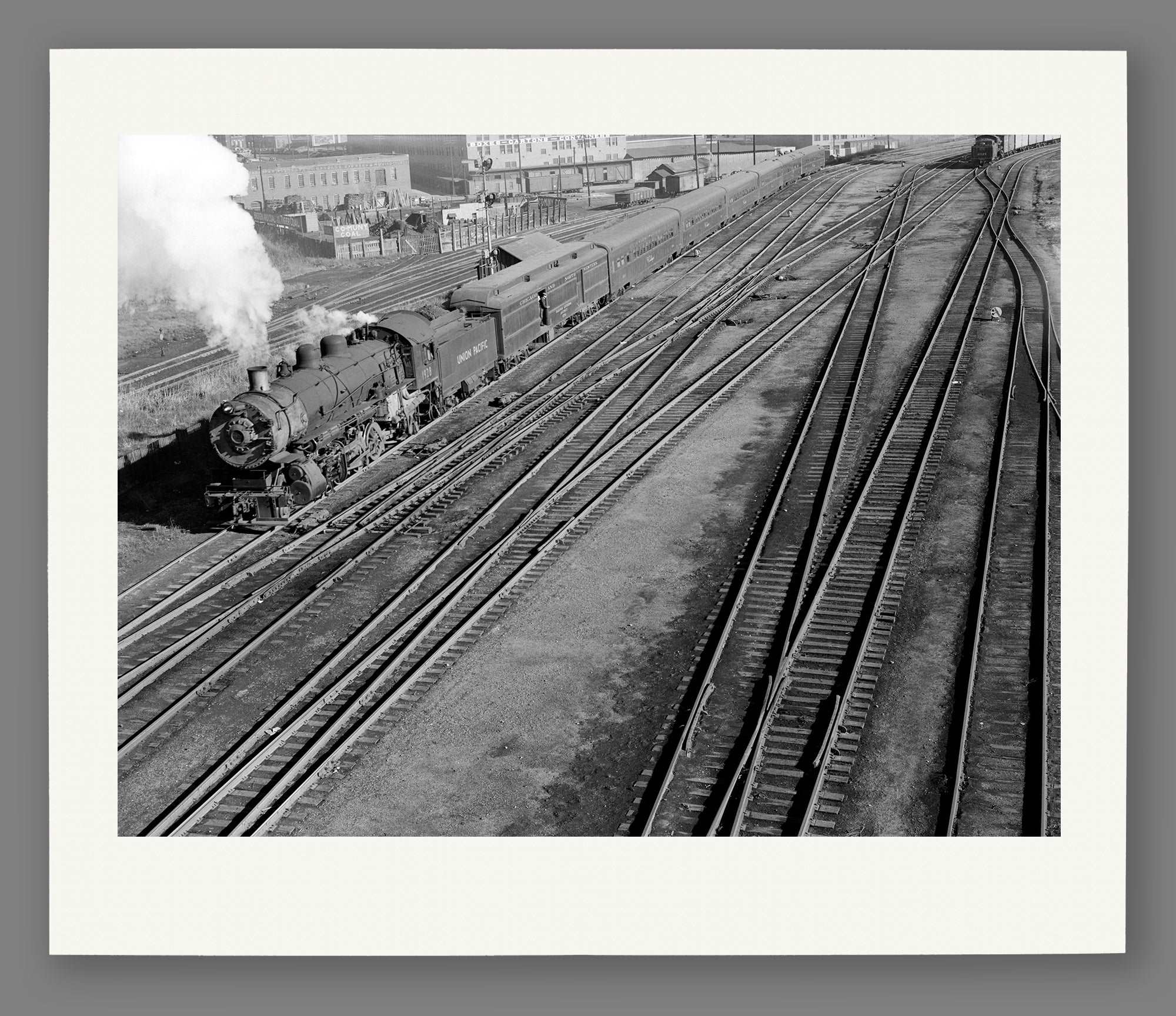 A mockup of a paper print reproduction of our vintage photograph of the Union Pacific Yards in Omaha