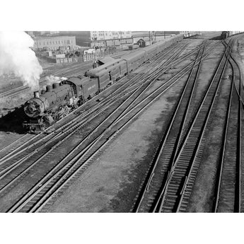 A restored, black and white vintage photograph of the Union Pacific Yards in Omaha, Nebraska