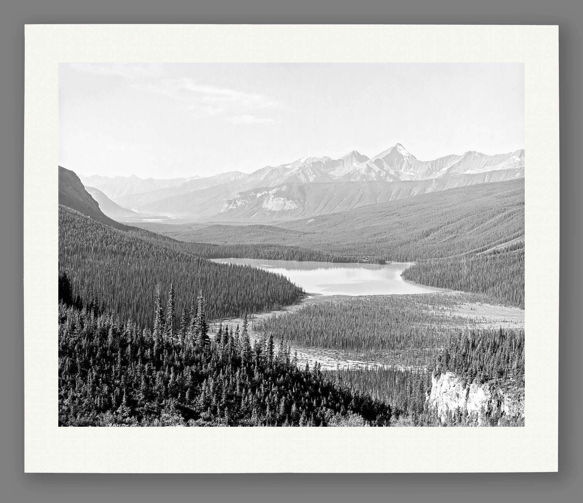 A paper print mockup featuring vintage photograph of Emerald Lake