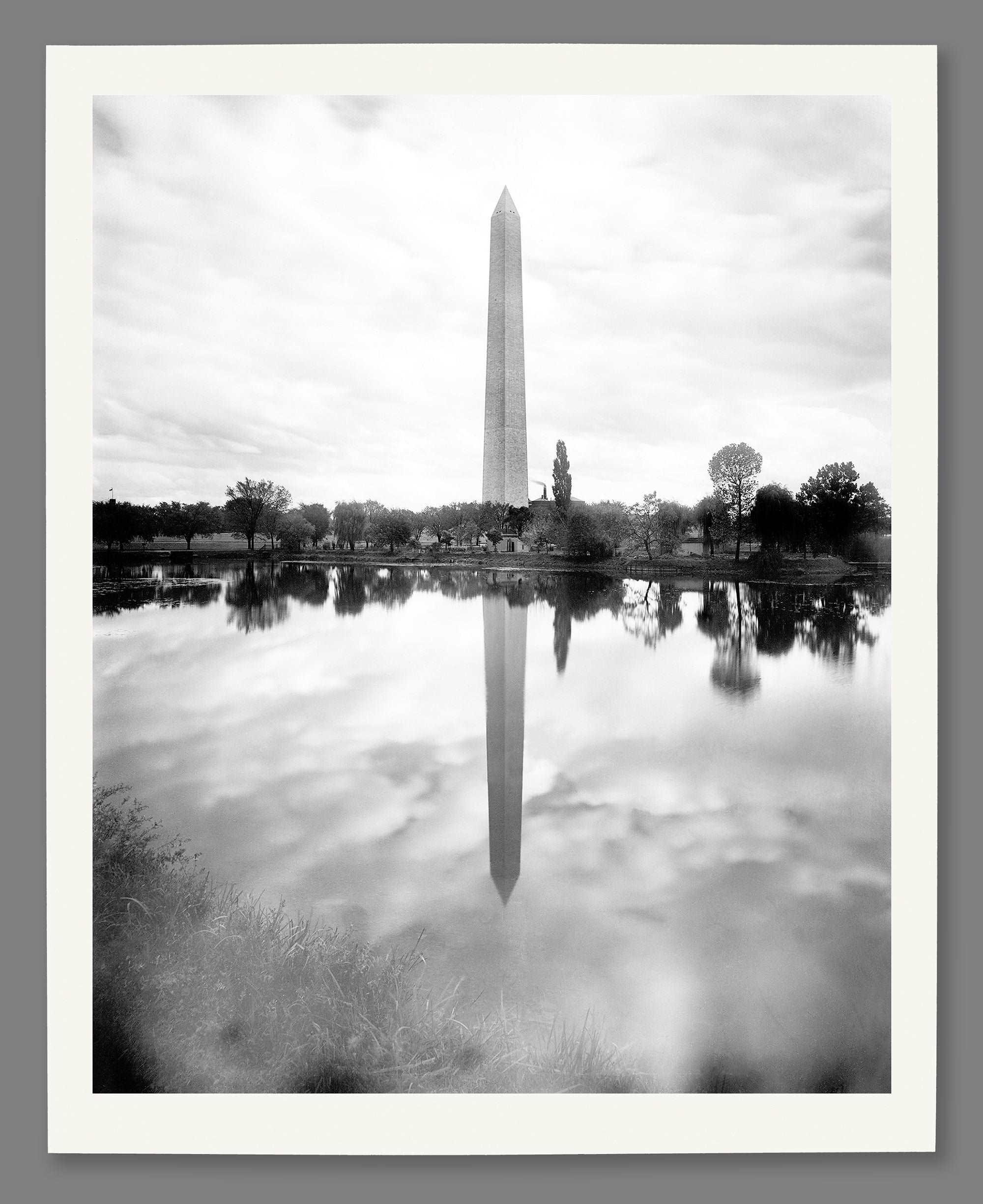 A paper print of a restored vintage image of the Washington Monument in Washington DC