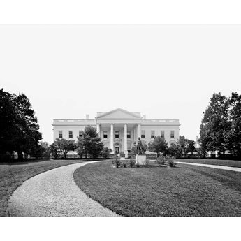 A vintage, black and white photograph of the White House in the 1860s
