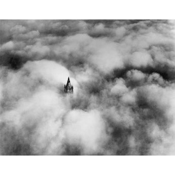 A black and white vintage photograph of Woolworth Tower in the Clouds, NYC