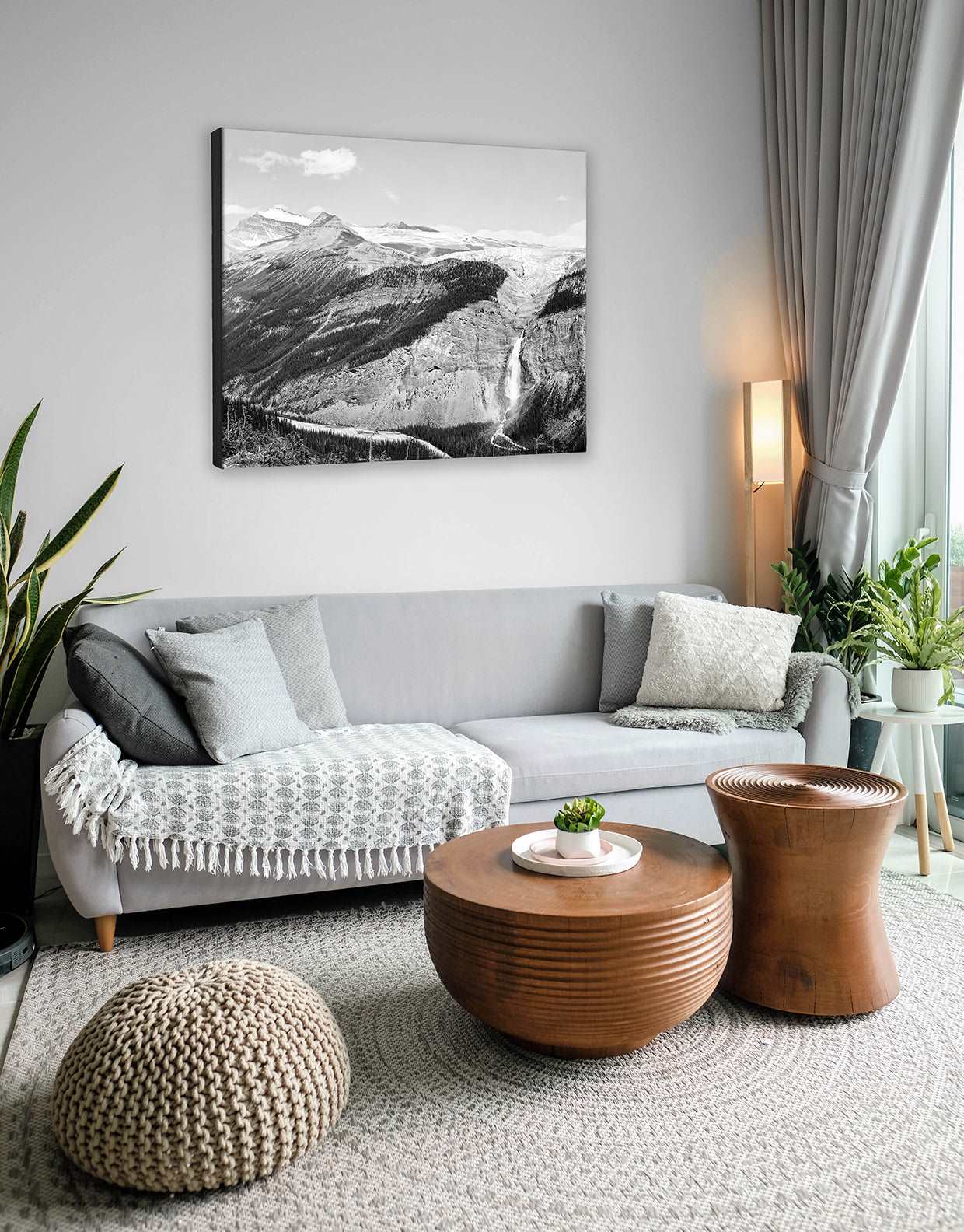 A digitally rendered canvas print reproduction of a vintage photo of Yoho Valley hanging in a neutral themed living room